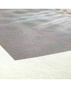 Vue zoomée sur le coin blanc d'un tirage photo fine art sur papier d'art mat Hahnemühle Bamboo 290g/m²
