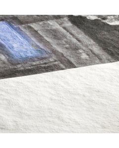 Vue zoomée sur le coin blanc d'un tirage photo fine art sur papier d'art mat Hahnemühle Torchon 285 g/m²